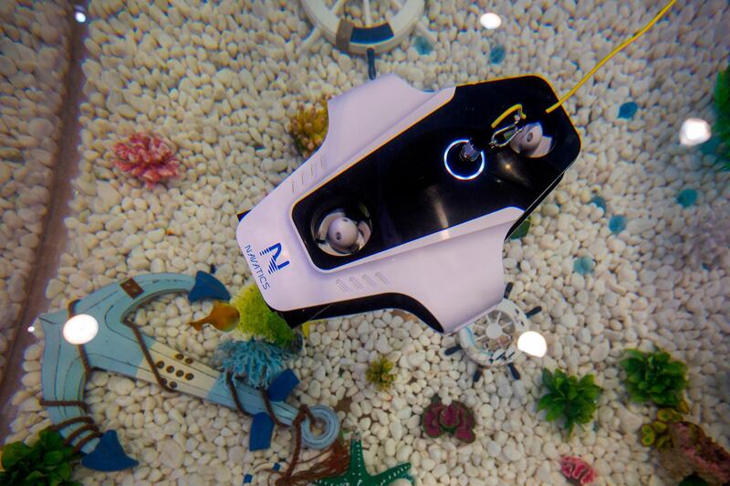 A Navatics Mito underwater drone is demonstrated. AFP