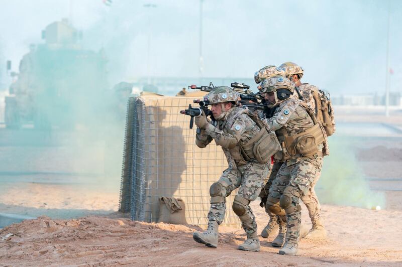 AL DHAFRA REGION, ABU DHABI, UNITED ARAB EMIRATES - June 26, 2019: Members of the UAE Armed Forces and the Jordanian Armed Forces participate in the joint military drill, Titled ‘Bonds of Strength’, at Al Hamra Camp.

( Hamad Al Mansouri for Ministry of Presidential Affairs )
---