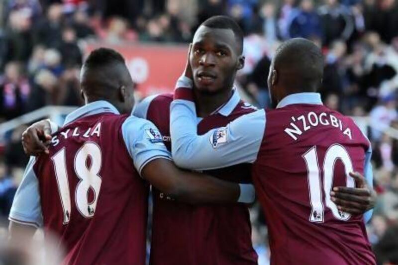 Christian Benteke, centre, will remain at Aston Villa after signing a new contract, while Charles N'Zogbia's days, right, seem to be numbered at Villa Park. Simon Bellis / AP Photo