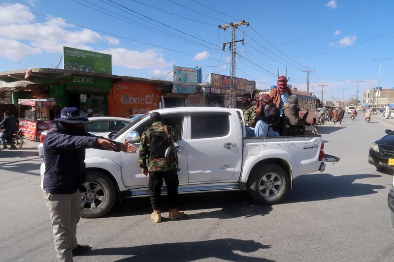 Pakistani security officials conduct checks at a roadside checkpoint in Quetta, the provincial capital of Balochistan province, Pakistan, a day after Iran said it struck two bases of the militant group Jaish Al Adl. EPA