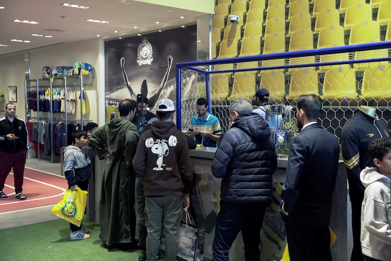 Fans visit the Al Nassr club store after Cristiano Ronaldo signed a deal with the Saudi club. Reuters
