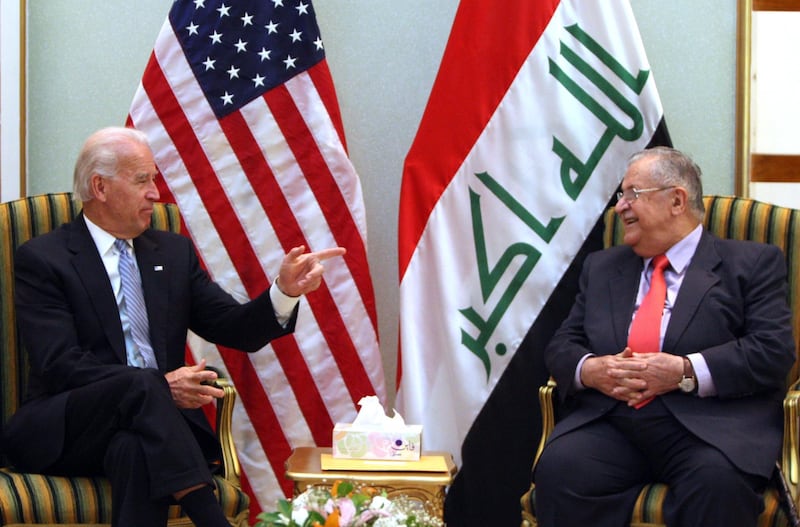 US Vice President Joe Biden gestures during his meeting with Iraqi President Jalal Talabani in Baghdad on January 13, 2011. AFP PHOTO/AHMAD AL-RUBAYE (Photo by AHMAD AL-RUBAYE / AFP)