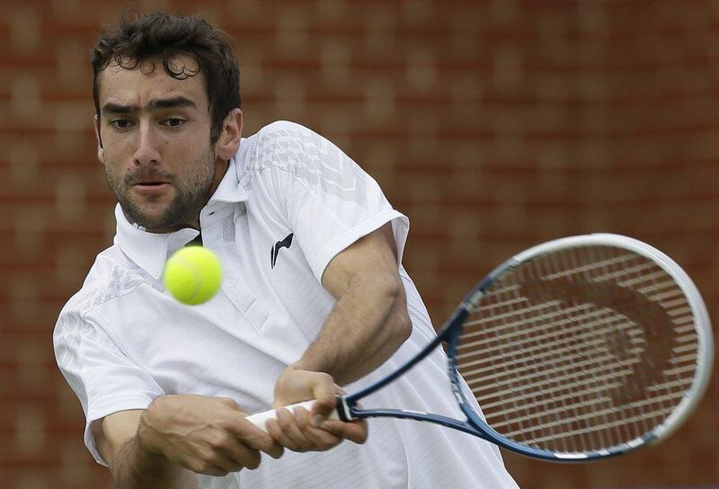 Marin Cilic has had the ban back-dated to May 1 this year, meaning he will be able to return to action on February 1, 2014. Alastair Grant / AP Photo