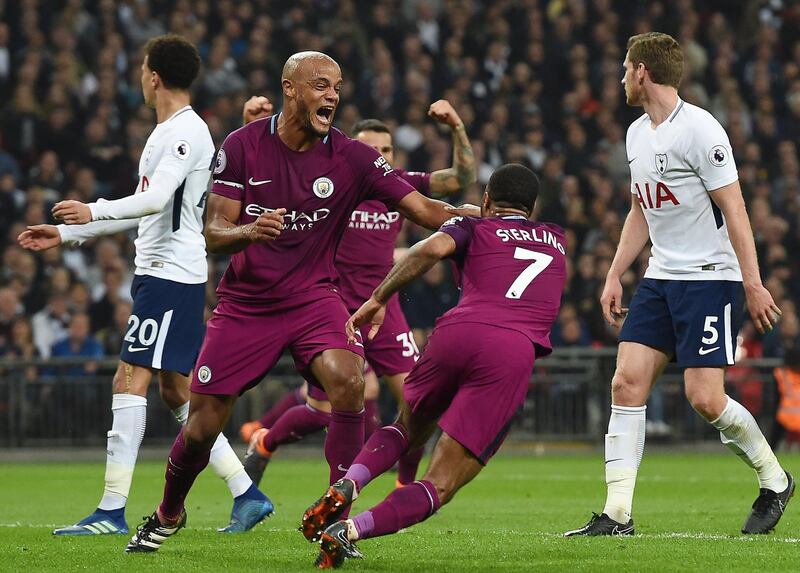 Manchester City's Raheem Sterling turns to celebrate after scoring his sides third. Andy Rain / EPA