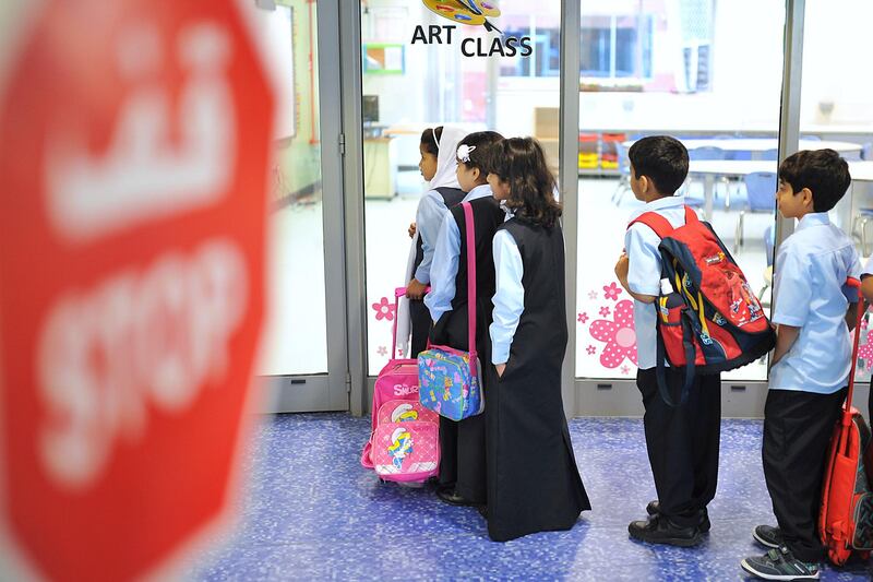 ABU DHABI, UNITED ARAB EMIRATES - - -  September 8, 2013 --- Students returned back to school at Mubarak Bin Mohamed School on Sunday.   ( DELORES JOHNSON / The National ) ***** Reporter is Kyle****** *** Local Caption ***  DJ-0809-NA-BackToSchool-013.jpg