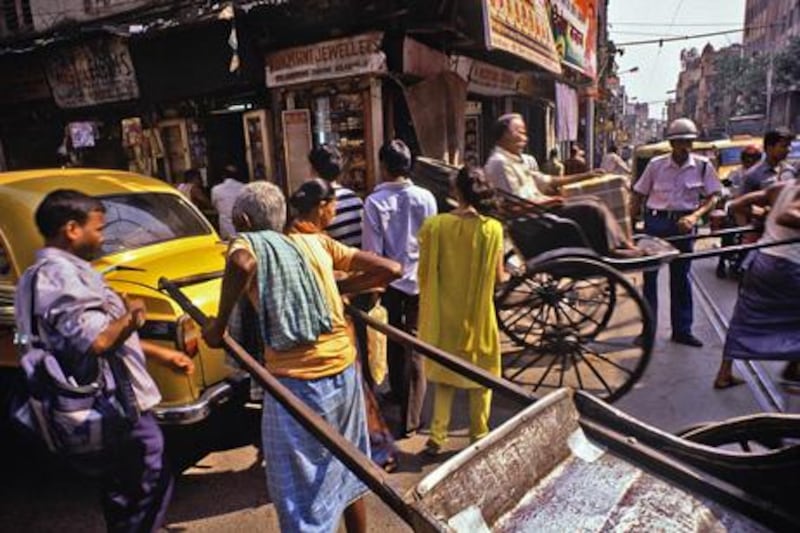 A busy junction in the poorer, congested area of Kolkata known as Black Town, as opposed to White Town – an area full of British colonial era buildings.