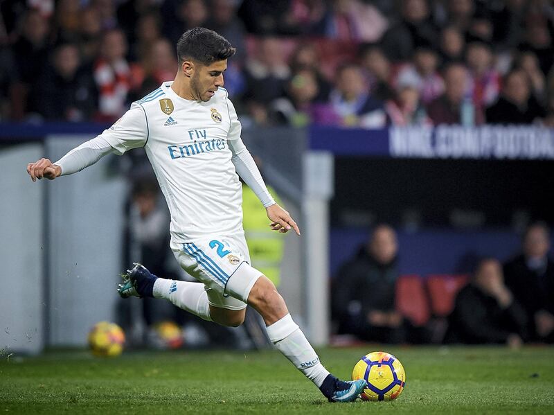 MADRID, SPAIN - NOVEMBER 18:  Marco Asensio of Real Madrid in action during the La Liga match between Atletico Madrid and Real Madrid at Wanda Metropolitano Stadium on November 18, 2017 in Madrid, Spain.  (Photo by fotopress/Getty Images)