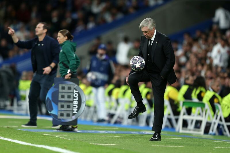Real Madrid manager Carlo Ancelotti juggles the ball on the touchline. Getty 
