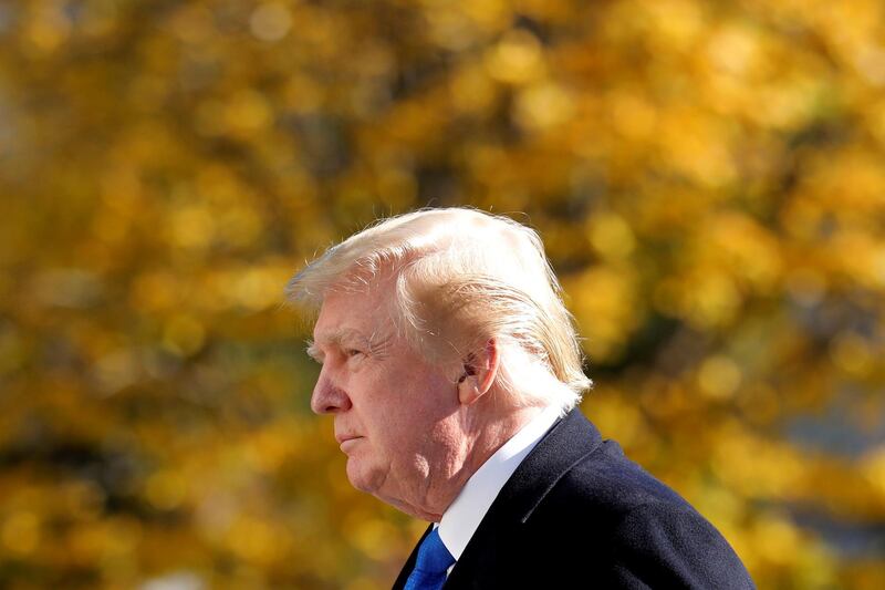 FILE PHOTO: U.S. President Donald Trump walks on the South Lawn of the White House upon his return to Washington from Camp David, U.S., November 29, 2020. REUTERS/Yuri Gripas/File Photo