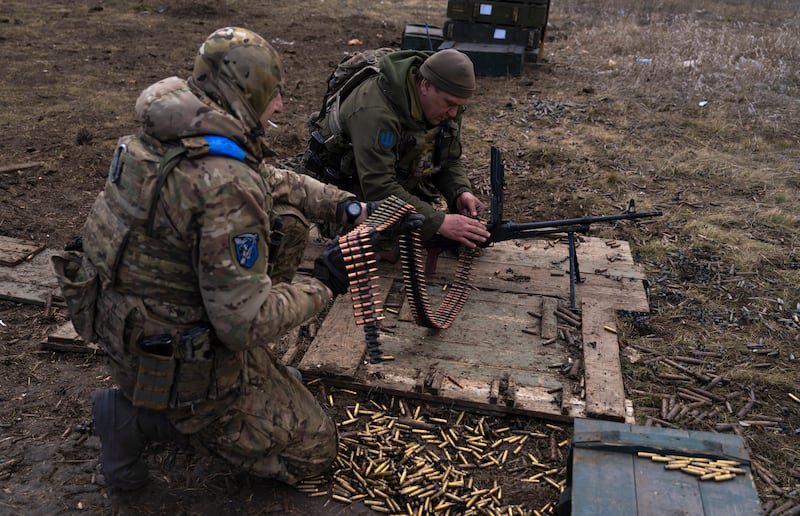 Ukrainian servicemen take part in military training at an undisclosed location near the frontline. EPA
