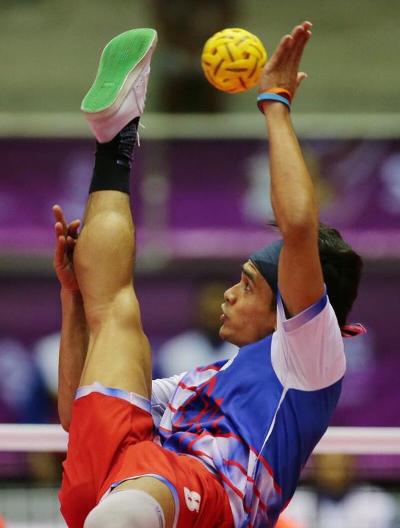 Malaysia’s Khairol Zaman in action during the semi final. Asia Sports Ventures / Action Images via Reuters