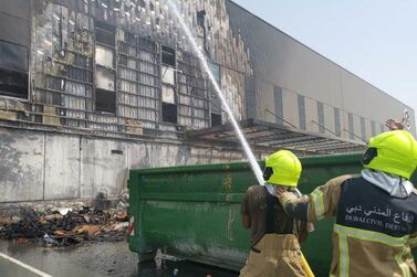 Firefighters dousing the blaze at a Dubai Duty Free warehouse. Courtesy: Dubai Civil Defence