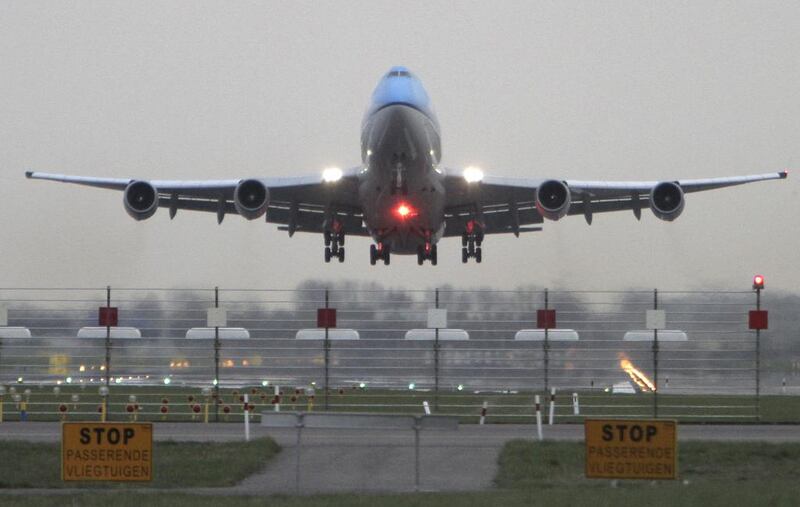 A KLM passenger plane takes off from Schiphol Airport in Amsterdam. The carrier is to test facial-recognition technology at the airport. Peter Dejong / AP