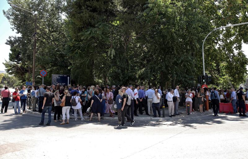 epa07726827 Citizens gather in an open area following an earthquake, in central Athens, Greece, 19 July 2019.An earthquake measuring 5.1 on the Richter scale shook Athens at 14:13 on 19 July 2019. The epicentre of the quake, according to Aristotle University of Thessaloniki professor of seismology Costas Papazachos was located in the Parnitha mountain range, above the Attica towns of Mandra and Magoula.  EPA/SIMELA PANTZARTZI