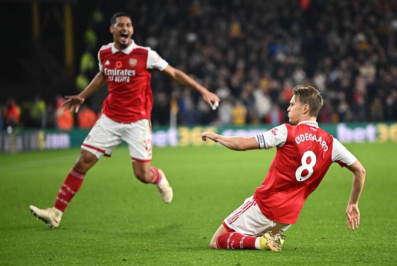 Arsenal's Norwegian midfielder Martin Odegaard celebrates scoring his team's second against Wolves. AFP