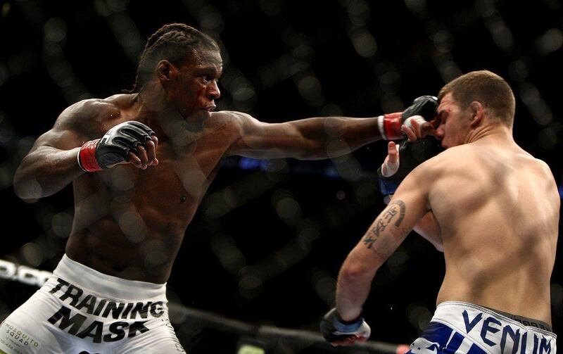 Clint Hester, left, and Andy Enz exchange blows during their middleweight fight on Saturday. Hester won by unanimous decision. Tim Larsen / AP  