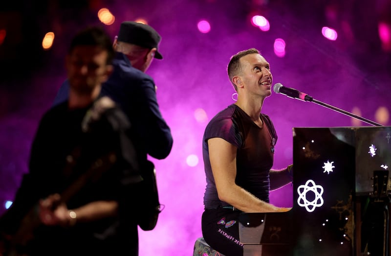 Guitarist Jonny Buckland, bassist Guy Berryman and drummer Will Champion provided a solid support team to lead vocalist Chris Martin for the night.
