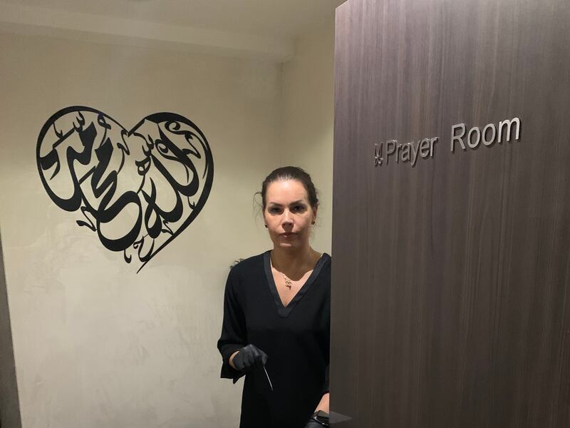 Nellie Simons, manager of Beautyspot salon in Knightsbridge, stands in the prayer room which suffered flood damage due to heavy rain. Photo: Laura O’Callaghan / The National