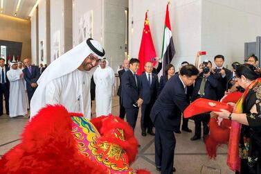 Dr Sultan Al Jaber (centre) the chief executive of Adnoc Group. BGP, a subsidiary of state-owned CNPC, was awarded contracts for seismic surveys onshore and offshore the emirate, Adnoc said. Credit: Adnoc