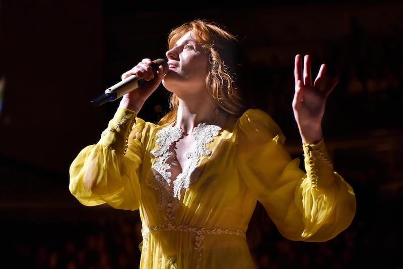 FILE - Florence Welch of Florence + The Machine performs during "The High As Hope Tour" in Chicago on Oct 19, 2018. Welch is supplying the lyrics and co-writing music for a stage musical of â€œThe Great Gatsby,â€ it was announced Wednesday. She will collaborate on the music with Thomas Bartlett. The story writer is Martyna Majok, who was awarded the 2018 Pulitzer Prize for Drama for â€œCost of Living.â€ (Photo by Rob Grabowski/Invision/AP, File)