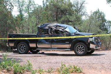 A driver in a pickup truck plowed into bicyclists competing in a community road race in Arizona on Saturday, critically injuring several riders before police chased down the driver and shot him outside a nearby hardware store. The White Mountain Independent via AP