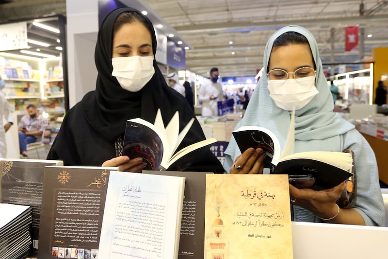 Two Saudi women at the Riyadh International Book Fair.
