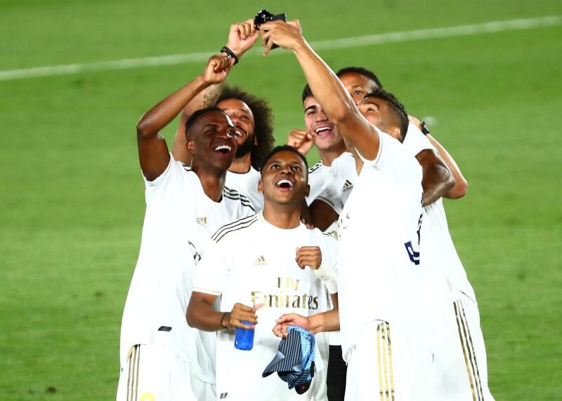 Real Madrid's Rodrygo,Vinicius and teammates celebrate after winning La Liga title. Reuters