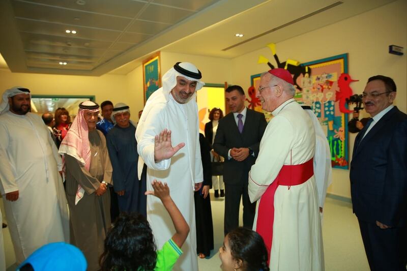 Sheikh Ahmed bin Saqr Al Qasimi, chairman of Ras Al Khaimah Economic Zone, and Bishop Paul Hinder, Apostolic Vicar of Southern Arabia, attend the official opening of St Mary’s Private High School, the emirate's first Catholic school on Tuesday. Courtesy St Mary’s Private High School