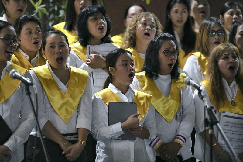 Abu Dhabi, United Arab Emirates - The Filipino choir at the last day of mass held at St. JosephÕs Cathedral in Mushrif. Khushnum Bhandari for The National