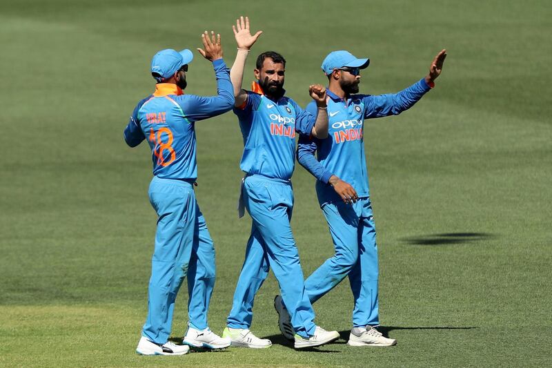 India's Mohammed Shami, center, celebrates the wicket of Australia's Marcus Stoinis with teammates during their one day international cricket match in Adelaide, Australia, Tuesday, Jan. 15, 2019. (AP Photo/James Elsby)
