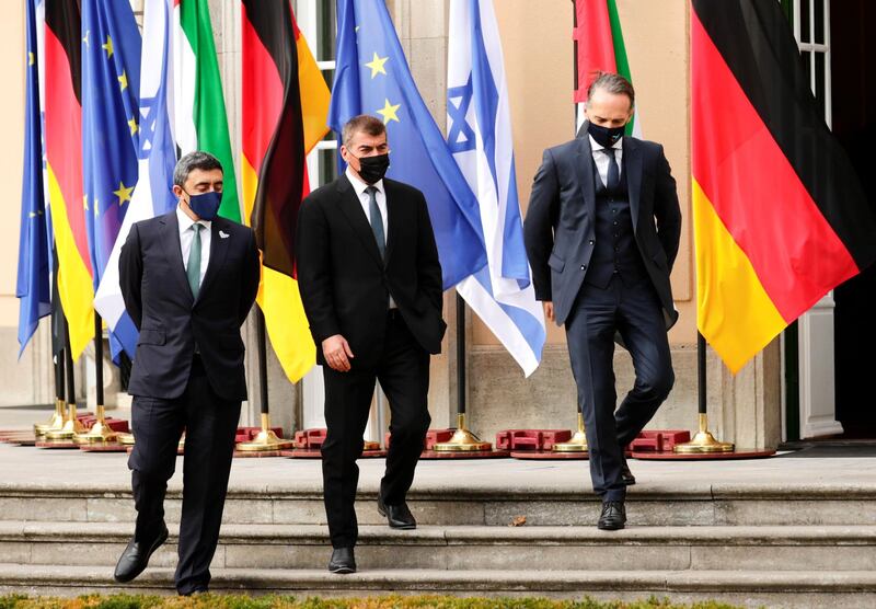 Sheikh Abdullah bin Zayed, his Israeli counterpart Gabi Ashkenazi and German Foreign Minister Heiko Maas before their historic meeting at Villa Borsig in Berlin, Germany  AFP