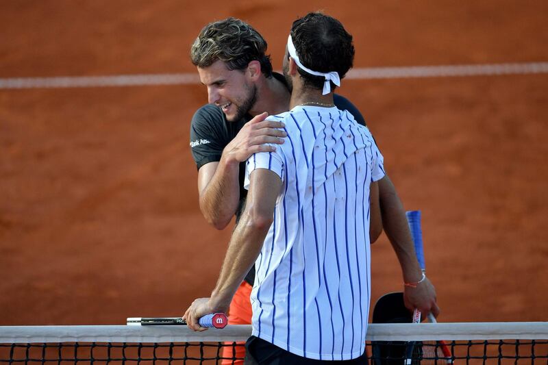 Grigor Dimitrov greets Dominic Thiem at the end of their match at the Adria Tour. AFP
