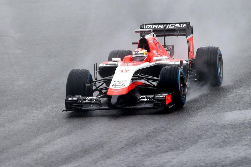 Jules Bianchi races during the rain-soaked Japanese Grand Prix, the race at which his fatal accident occurred. Mark Thompson / Getty Images