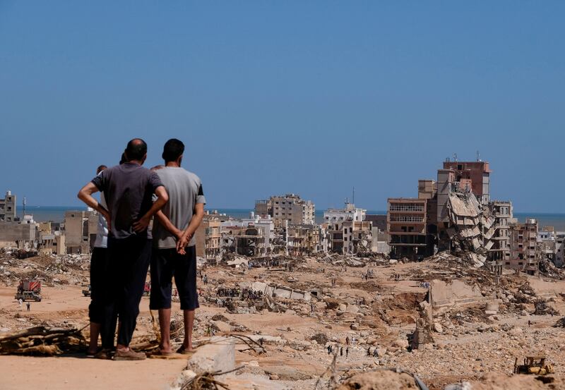 People view areas damaged in the flooding in Derna, Libya. Reuters