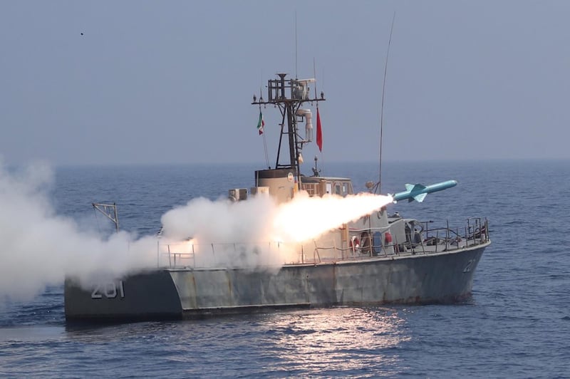 A missile being fired from an Iranian Navy warship during a navy military drill in the Gulf of Oman. EPA via Iranian military