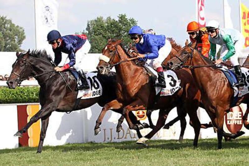 Royston Ffrench, on board Buzzword, No 3, won his first Classic race in Germany yesterday to take the Deutsches Derby in Hamburg.