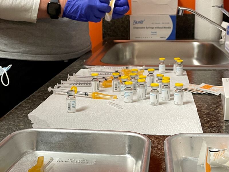 Healthcare workers prepare monkeypox vaccines at the Test Positive Aware Network nonprofit clinic in Chicago. Reuters