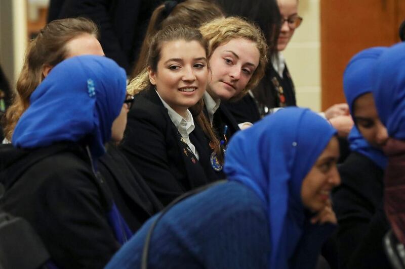 Students from the MDQ Academy Islamic School and Saint Anthony’s High School speak during a field trip at the Roman Catholic school in Huntington, New York, on April 26, 2017. Shannon Stapleton / Reuters