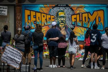 People visit a memorial to George Floyd in Minneapolis, Minnesota, on May 31, 2020. AP Photo