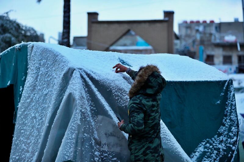 Snow envelopes Tahrir Square in Baghdad, Iraq. AP Photo