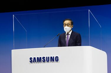 Kim Ki-nam, co-vice chairman and co-chief executive officer of Samsung Electronics Co., speaks from behind a transparent screen during the company's annual general meeting at the Suwon Convention Center in Suwon, South Korea, March 17, 2021. Bloomberg