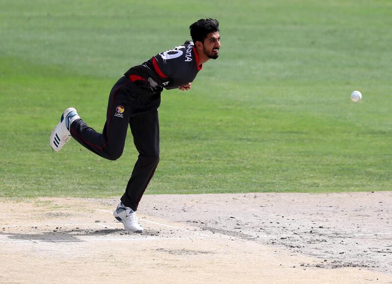 Dubai, United Arab Emirates - April 29, 2019: UAE's Muhammad Akasha Tahir bowls in the game between UAE U19's and Iran U19's in the Unser 19 Asian Cup qualifiers. Monday the 29th of April 2019. Dubai International Stadium, Dubai. Chris Whiteoak / The National