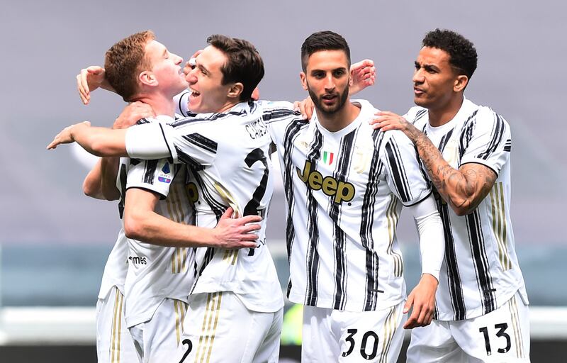 Dejan Kulusevski celebrates scoring Juventus' first goal with Federico Chiesa, Rodrigo Bentancur and Danilo. Reuters