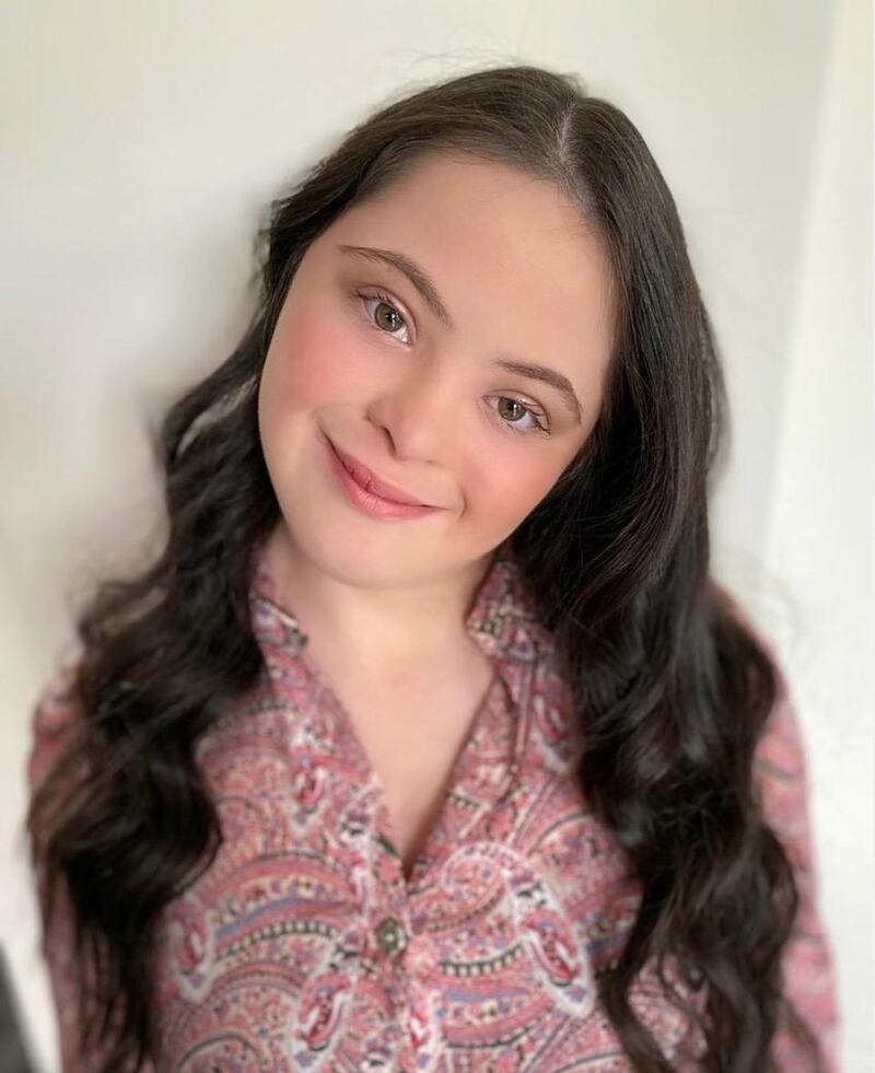 Ellie Goldstein is the first model with Down syndrome to pose for Gucci Beauty. Instagram / @elliejg16_zebedeemodel  