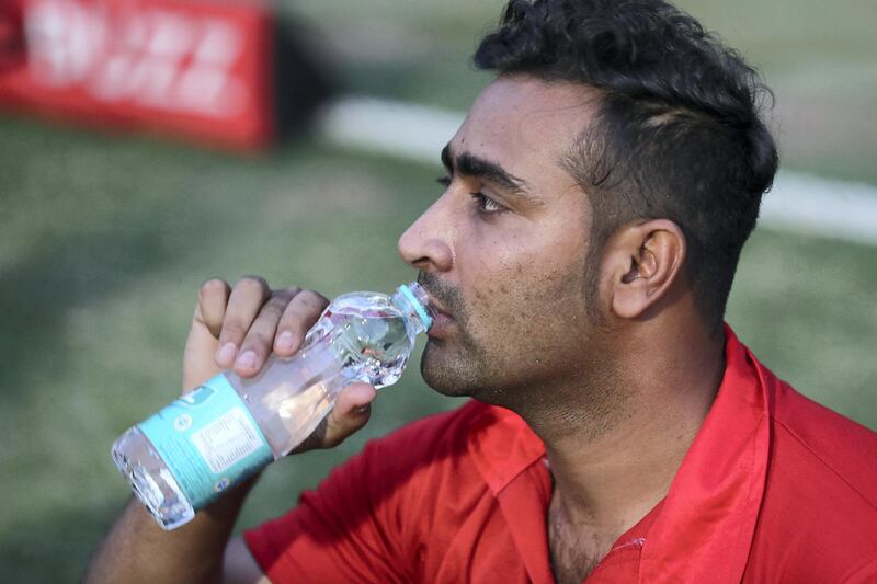 Players break their fast before the Sharjah Ramadan Cup game between MGM Cricket Club v Pacific Group in Sharjah on April 27th, 2021. Chris Whiteoak / The National. 
Reporter: Paul Radley for Sport