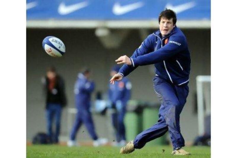 Francois Trinh-Duc, France's fly-half, passes the ball during training yesterday.