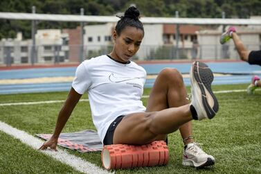 Aziza Sbaity rolls out her hamstring on a foam roller, whilst warming up for training. She had suffered for years with hamstring syndrome. (Matt Kynaston)