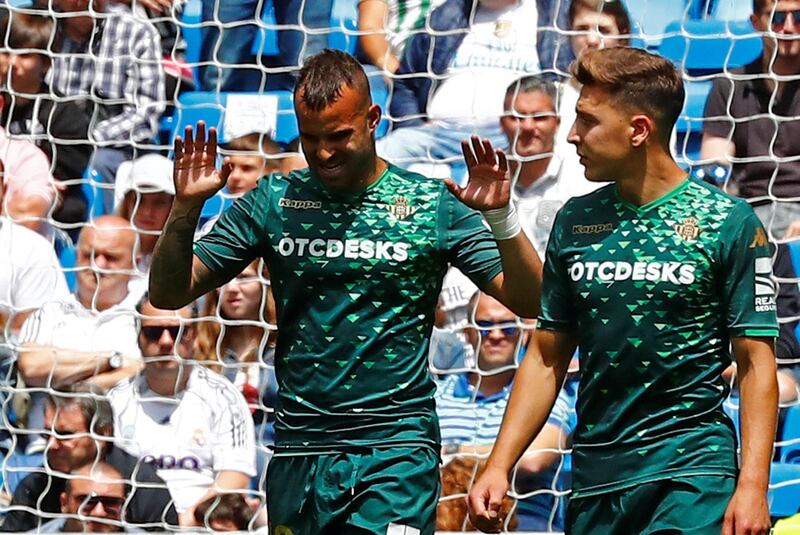 Real Betis' Jese Rodriguez celebrates scoring their second goal with Loren Moron. Reuters