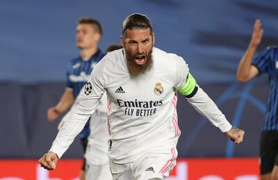 epa09078794 Real Madrid's defender Sergio Ramos celebrates after scoring the 2-0 goal during the UEFA Champions League round of 16 second leg soccer match between Real Madrid and Atalanta held at Alfredo Di Stefano stadium, in Madrid, central Spain, 16 March 2021.  EPA/JuanJo Martin