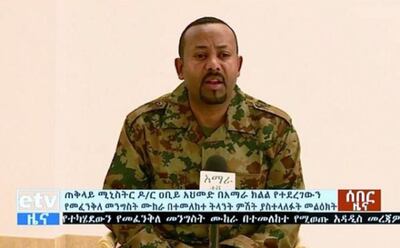 In this videograb released by the Ethiopian TV broadcast, Ethiopia's Prime Minister Abiy Ahmed addresses the public on television on June 23, 2019 after a failed coup.  Ethiopia's army chief and the president of a key region have been shot dead in a wave of violence highlighting the political instability in the country as Prime Minister Abiy Ahmed tries to push through reforms.  / AFP / Ethiopian TV / HO

